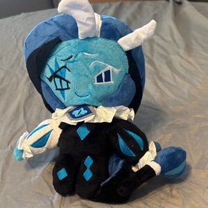 Blue and Black Stuffed Animal Toy